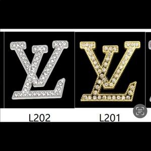 3 Silver LV charms, 3 Silver Gucci Arrow Charms, 2 Channel Silver Charms. $20